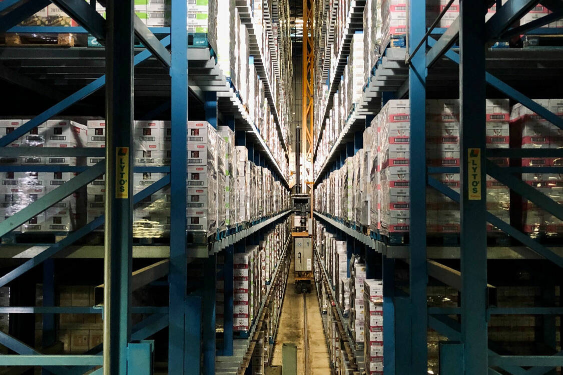 aisles of stacked boxes
